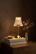 Cordless ribbed glass table lamp with gold base